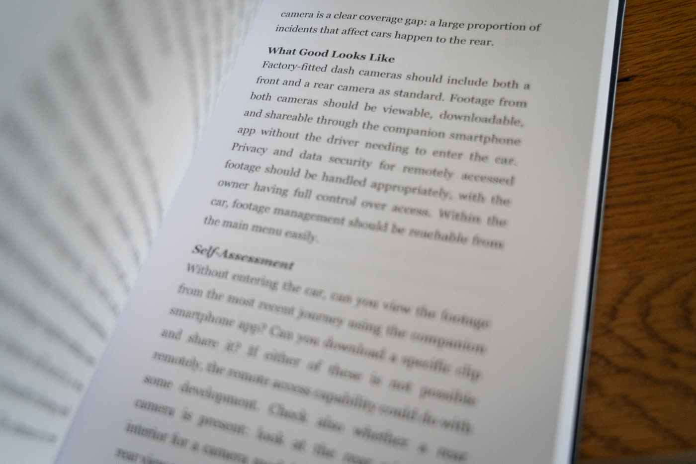 An interior spread of The UK Standard showing a findings page
